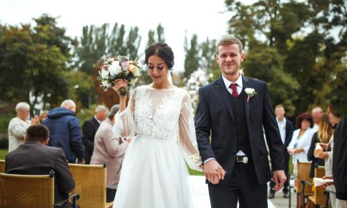 happy-groom-and-beautiful-bride-wedding-ceremony-under-the-arch-decorated-with-flowers-wedding-day-.jpg